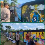 Anggota Polres Sukamara Amankan Jalannya Lomba Mural 